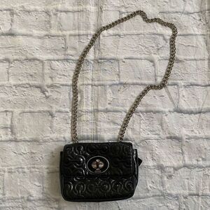 Coach mini shoulder/crossbody bag w/twist latch closure w/satin inner lining